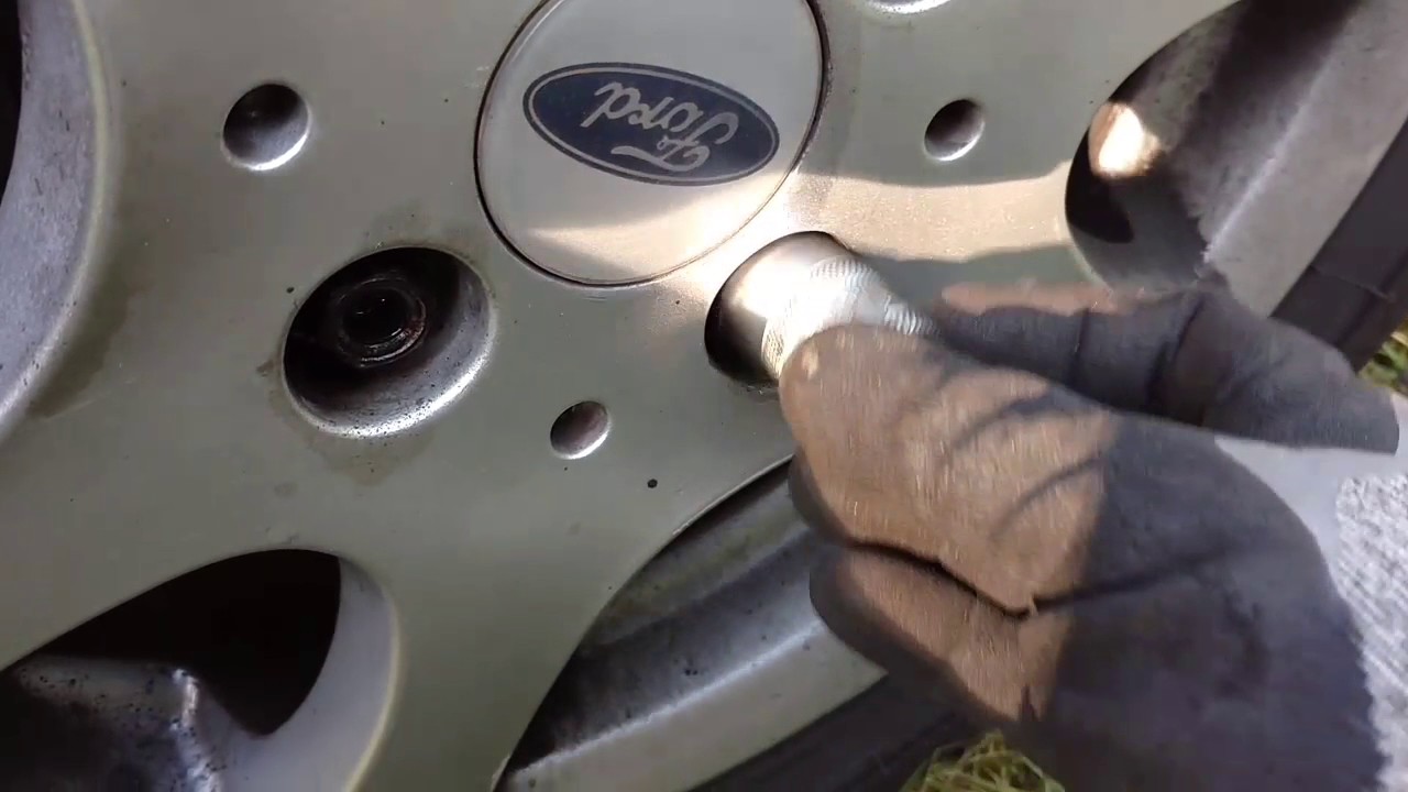 Locking wheel nut removal process
